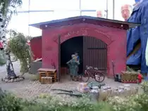 Anl��lich einer Tagung der ARGE Spur 0, fand in Wismar eine Modellbahn-Ausstellung statt. Hier habe ich diese kleine Szene vor einem G�terschuppen (Spur 0)abgelichtet. Wismar 03.06.2011