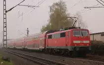 Kurz nach dem Bahnhof Korschenbroich ist die 111 160-8 in schiebender Rolle zu sehen. Es ist ein RE4 Zug auf dem Weg nach Dortmund......4.4.2012