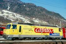 RhB - Ge 4/4 III 647  GR�SCH  am 27.02.2000 in Landquart - Drehstrom-Universallokomotive - �bernahme 20.09.1994 - SLM5634/ABB - 3200 KW - Gewicht 62,00t - L�P 16,00m - zul�ssige Geschwindigkeit 100 km/h - Logo RhB deutsch - Werbung: CAPITO - gescanntes Dia 
