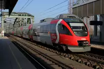 Schnellbahn 26631, von Hollabrunn nach Wiener Neustadt Hauptbahnhof �ber Pottendorf-Landegg, 50 Jahre Wiener Schnellbahn (4124 014) mit 4023 011 hier bei der Einfahrt in die Haltestelle Wien Handelskai; am 16.03.2012
