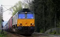 Die Class 66 DE6309 von DLC Railways kommt die Gemmenicher-Rampe herunter mit einem Containerzug aus Belgien und f�hrt nach Aachen-West.
Aufgenommen an der Vaalser-Stra�e bei Wolken am 13.4.2012.