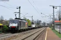ES 64 F4 - 084 von MRCE ausgeliehen von Locon mit leeren Flachwagen Richtung N�rnberg bei der Durchfahrt in Regensburg-Pr�fening, 10.04.2012