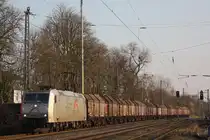 TXL 185 539 am 23.3.12 mit einem Stahlzug bei der Durchfahrt durch Ratingen-Lintorf.