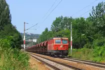 44er-Thementag: 1044 095 hatte am 22.06.2006 eine Sonderladung Schotter f�r den Bahnhofsumbau Inzersdorf (Ort) am Haken und wurde zwischen H�tteldorf und Maxing aufgenommen.