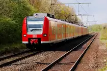 Eine RE8 auf dem Weg nach Koblenz in J�chen kurz vorm Bahnsteig Gleis 2 am Sonntag den 22. April 2012