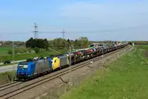 185 512-1 zieht einen Dispo-Taurus und einen BMW Autozug von M�nchen Nord kommend an der Eschenrieder Spange vorbei nach Augsburg, 26.04.12