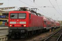 Berlin, wir fahren nach Berlin hie� es am 29.04.2012 114 033-4 mit dem Fu�ballsonderzug von Rostock Hbf nach Berlin Sch�nefeld Flughafen kurz vor der Ausfahrt im Rostocker Hbf 