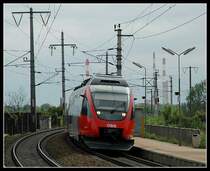 4024 046 als RSB von Wien S�d �ber Wien Floridsdorf nach Wiener Neustadt am 4.6.2006 bei der Durchfahrt der Station Lobau.