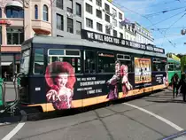 BVB - Trambeiwagen mit Werbung B 1491 unterwegs in Basel am 04.05.2012