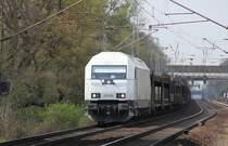 223 154 der PCT bringt einen leeren Autotransportzug in Richtung Seelze. Aufgenommen am 17.04.2012 in Dedensen-G�mmer.