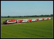 1014 002 am 11.6.2006 mit dem E 2817  Blaufr�nkisch  auf dem Weg nach Deutschkreuz kurz nach dem Bahnhof Wampersdorf.