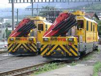 Xmf 9918 + 9919 im alten Arosaareal in Chur am 11.07.2005. Nach Er�ffnung der neuen Gleisanlagen an diesem Morgen, werden die Dienstfahrzeuge f�r den Abbruch der Fahrleitungsanlage verwendet.