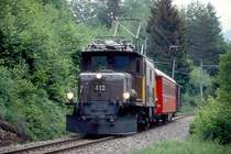RhB GmP 4532 von Samedan nach Landquart am 03.06.1992 zwischen Surava und Tiefencadtel mit E-Lok Ge 6/6I 412 - B - Gb. Hinweis: gescanntes Dia
