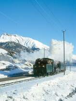 RhB Dienst-Dampfzug 9732 von Samedan nach St.Moritz am 09.02.1997 Einfahrt Celerina mit Dampflok Tender voraus G 4/5 108 - B 2245 - A� 1102 - B� 2060 - D� 4052I. Hinweis: gescanntes Dia

