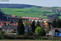 Unbekannte Br 111 mit RE 4263 nach M�nchen Hbf auf der Donaubr�cke bei Regensburg-Pr�fening, 10.04.2012