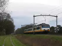 SGM 2950 mit Regionalzug RE 9646 Deurne-‘s Hertogenbosch bei Vlierden am 9-4-2012.