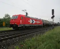 Die 185 606 der Firma HGK (H�fen und G�terverkehr K�ln) fuhr am 06.06.12 mit einem B�terzug bei W�rzburg.Das Bild wurde kurz nach Th�ngersheim gemacht.