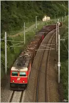 1144 040 mit einen Schrottzug in Richtung Villach. 
Thalheim 9.6.2012
