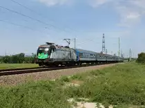 Die 470 503 mit einem Personenzug am 09.06.2012 unterwegs bei Erdőh�t.
