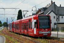 Niederflurwagen 4026 trgt eine neue Ganzreklame fr  Kttgen Hrakustik . Unterwegs im Stadtteil Weiden auf der aachener Strae am 11.06.2012.