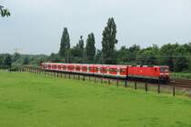 143 854-8 mit der S6 nach Kln-Nippes in Langenfeld (Rhlnd.) am 20.06.2012