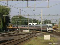 Eloc 1733 met een stam IC-rijtuigen waaronder een Bpmbdzf(!) als trein 147 naar Hannover Hbf te Hengelo - 13 juni 2006
Eloc 1733 mit IC-Wagen und ein Bpmbdzf(!) in Zug 147 nach Hannover Hbf in Hengelo - 13 juni 2006