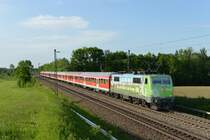 111 039 mit einem RE nach Mnchen Hbf am 19.05.2012 unterwegs bei Hilperting.