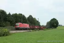 1116 180 (�BB) f�hrt am 4. August 2012 um 10:29 Uhr mit einem G�terzug durch Osterm�nchen