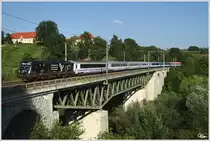 1116 153 f�hrt mit EC 103  Polonia (Warschau - Villach) �ber das Taggenbrunner Viadukt nahe St.Veit an der Glan.
5.8.2012