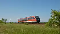 Ein Desiro umfährt in einem weiten Bogen als RB Saalfeld - Leipzig bei Groß Dalzig den ehemaligen Zwenkauer Tagebau südlich von Leipzig. (27.05.2012)