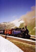 Ein Zug der Dampfbahn Furka-Bergstrecke (Meterspur Adh�sions- und Zahnradbahn), gezogen von der HG &frac34; 1 Furkahorn, am Haltepunkt Muttbach-Belv�d�re 2120m, im Juli 2006.