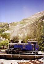 Die Lok HG &frac34; 1 Furkahorn der Dampfbahn Furka-Bergstrecke (Meterspur Adh�sions- und Zahnradbahn), auf der Drehscheibe in Gletsch 1762m, im Juli 2006.