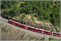 ABe 8/12 mit BerninaExpress 950 oberhalb Alp Gr�m. (11.08.2012)