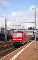 Kassel-Wilhelmsh�he, Ausfahrt in Richtung Frankfurt am Main (RE mit 111 198-8 am 25.8.2012).