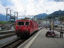 HGe 4/4'' 101 ''Ville de Sion/Sitten'' am 4.8.2012 in Disentis/Must�r mit dem GEX 908. Ab hier wird die Zahnrad betriebene MBG-Lok durch eine Adh�sions-Lok der RhB ersetzt.