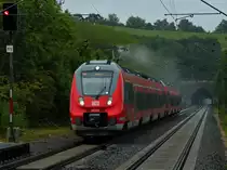 RE9 Hamsterbacken-Doppel 442 754 und 442 755 am 31.08.2012 mit dem Ziel Aachen Hbf von Siegen kommend auf der KBS 480 bei Eilendorf. Schlechtes Wetter f�r den Fotografen, es regnet unaufh�rlich. Daf�r wird man mit mit solch sch�nen Gischtfahnen am Stromabnehmer und einem Pfiff vom Hamster belohnt (Gru� an den freundlichen Tf).