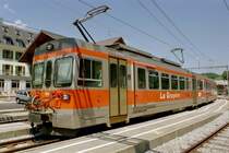 tpf (ex GFM)1000 mm ..BDe 4/4 122 + Bt 233.. vor dem Bahnhof in Montbovon am 01.07.2006