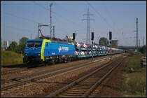 PKPC EU45-805 mit neuen Fiat's am 10.09.2012 bei der Durchfahrt Berlin Sch�nefeld Flughafen