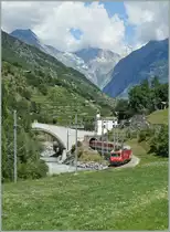 Eine MGB HGe 4/4 mit einem Personenzug auf dem Weg nach Zermatt bei Neubr�ck.
22. Juli 2012