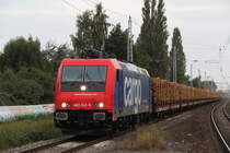 482 042-9 Mit Holzzug von Rostock-Bramow nach
Borstel(Kr.Stendal)bei der Durchfahrt im S-Bahnhof Rostock-Holbeinplatz,Ab Borstel �bernimmt dann die PRESS den Zug bis 
Stendal-Niederg�rne.16.09.2012 