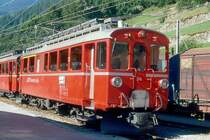 RhB - ABe 4/4 I 34 am 17.07.1989 in Poschiavo - Gleichstromtriebwagen Bernina - Baujahr 1908 - SIG/Al/SAAS - 450 KW - Gewicht 30,00t - 1./2.Klasse Sitzpl�tze 12/27 - L�P 13,93m - zul�ssige Geschwindigkeit 55 km/h - �3=06.08.1981 - Logo RhB italienisch - Lebenslauf: ex BB BCe 4/4 4 - 1943 RhB BCe 4 /4 4 - 1947 BCe 4/4 34 - 1964 ABe 4/4 34. Hinweis: Die Triebfahrzeugserie bestand urspr�nglich aus 14 Fahrzeugen mit den Nummern 1 bis 14, Triebwagen ist inzwischen gelb lackiert, gescanntes Dia
