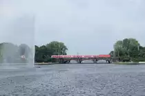 Eine unbekannte 112 mit einem Regionalexpress am 05.07.2012 auf der Lombardsbr�cke in Hambur