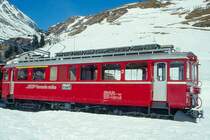 RhB - ABe 4/4 I 34 am 28.02.1998 in Alp Gr�m - Gleichstromtriebwagen Bernina - Baujahr 1908 - SIG/Al/SAAS - 450 KW - Gewicht 30,00t - 1./2.Klasse Sitzpl�tze 12/27 - L�P 13,93m - zul�ssige Geschwindigkeit 55 km/h - �3=06.08.1981 �2=15.05.1992 - Logo RhB italienisch - Lebenslauf: ex BB BCe 4/4 4 - 1943 RhB BCe 4 /4 4 - 1947 BCe 4/4 34 - 1964 ABe 4/4 34. Hinweis: Die Triebfahrzeugserie bestand urspr�nglich aus 14 Fahrzeugen mit den Nummern 1 bis 14, Triebwagen ist inzwischen gelb lackiert, gescanntes Dia
