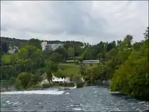 - Am Rheinfall - F�r Paddelboote ist hier Schluss, aber die Thurbo GTW RABe 526 Doppeleinheit f�hrt ungehindert von Schaffhausen nach B�lach an den Rheinf�llen vorbei in Neuhausen am Rheinfall. 13.09.2012 (Hans)