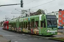 Niederflurwagen 4096 tr�gt eine neue Ganzreklame  Hockey in K�ln . Zu sehen an seinem ersten Linieneinsatztag mit der neuen Werbung an der Haltestelle Weiden Schulstra�e am 06.10.2012.