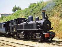 Lok E 162 (Henschel 1905) in Amarante (9. Juni 1986). - Eine Lok gleicher Bauart (E 164) verkehrt heute auf den Gleisen der CJ im Schweizer Jura.