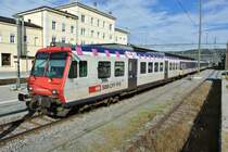 Der ex. MThB Steuerwagen 50 85 29-35 974-9 am Schluss des RE 2673 beim Zwischenhalt in Porrentruy, 18.10.2012.