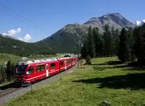 Zwischen den Bahnh�fen Morteratsch und Surovas ist R 1656 von Tirano kommend am 19.08.2012 unterwegs nach St. Moritz.