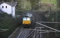 Die Class 66 V266/PB10 von der Rurtalbahn-Cargo kommt die Gemmenicher-Rampe hochgefahren und f�hrt als Lokzug aus Aachen-West nach Montzen-Gare(B) und  f�hrt gleich in den Gemmenicher-Tunnel hinein.
Aufgenommen in Reinartzkehl in der Abendstimmung am 31.10.2012.