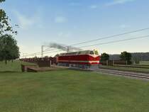 119 074-4 der DR mit Kieszug unterwegs.